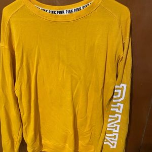 yellow oversized long sleeved vs pink shirt
